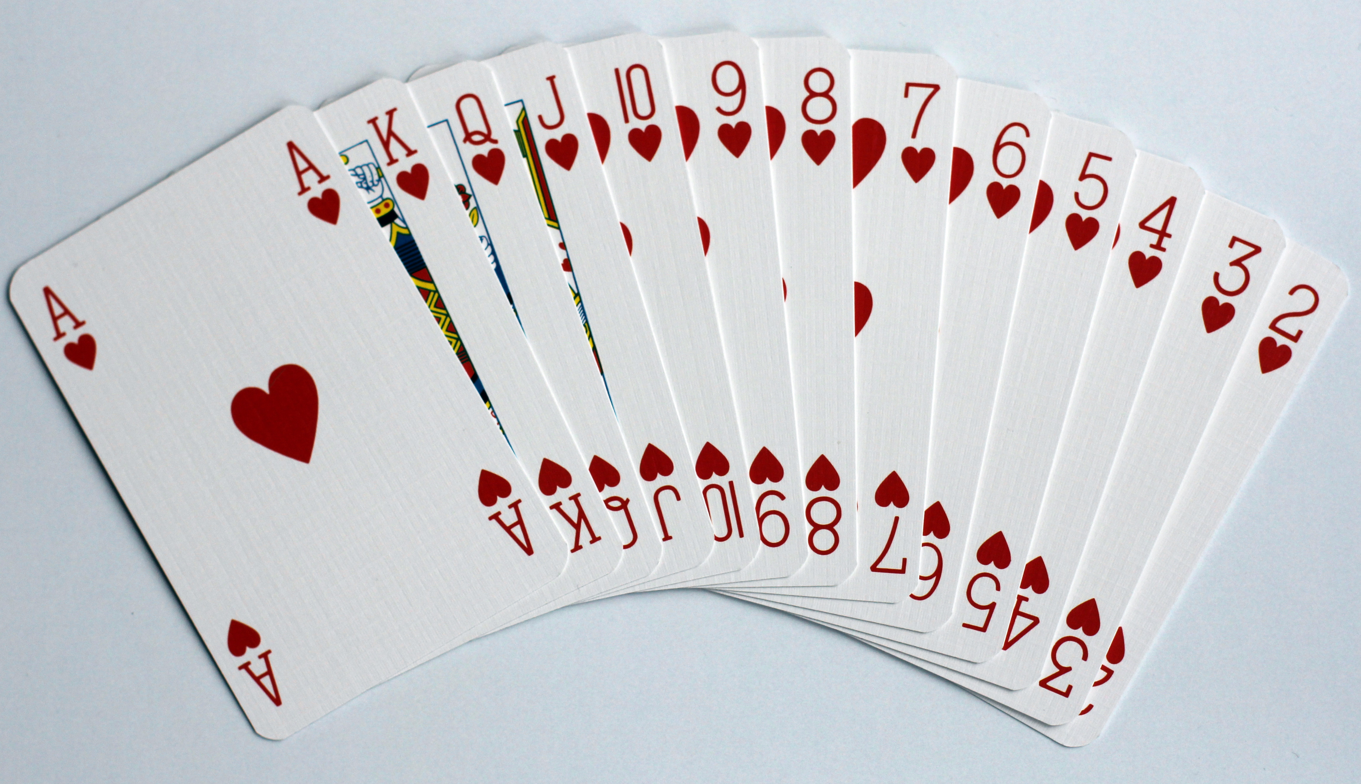 Fanned out cards of the heart suit